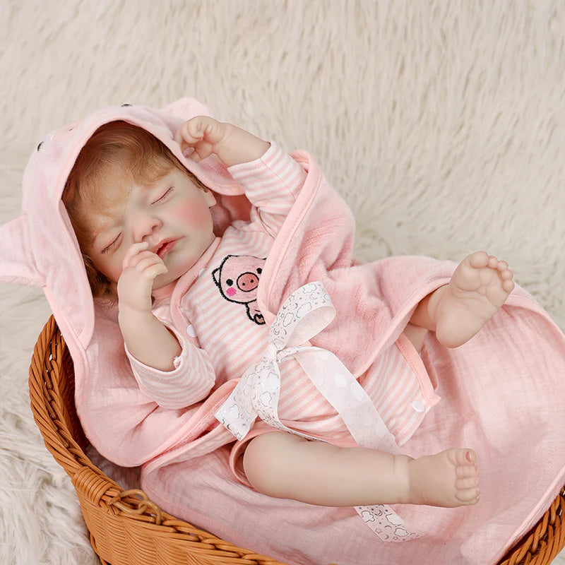 22 Zoll lebensechte Reborn-Babypuppe im Ferkel-Anzug