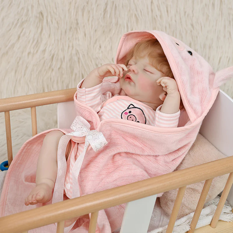 22 Zoll lebensechte Reborn-Babypuppe im Ferkel-Anzug