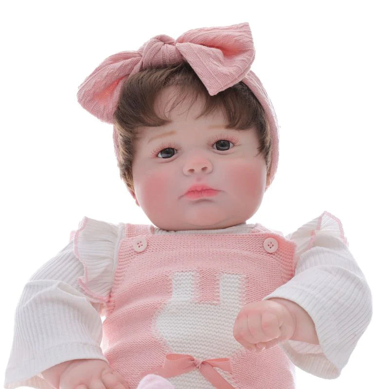 26 Zoll / 65 cm realistische Vinyl-Babypuppe im rosa Outfit mit Schleifen-Stirnband – handbemalte Sammlerpuppe mit braunen Augen