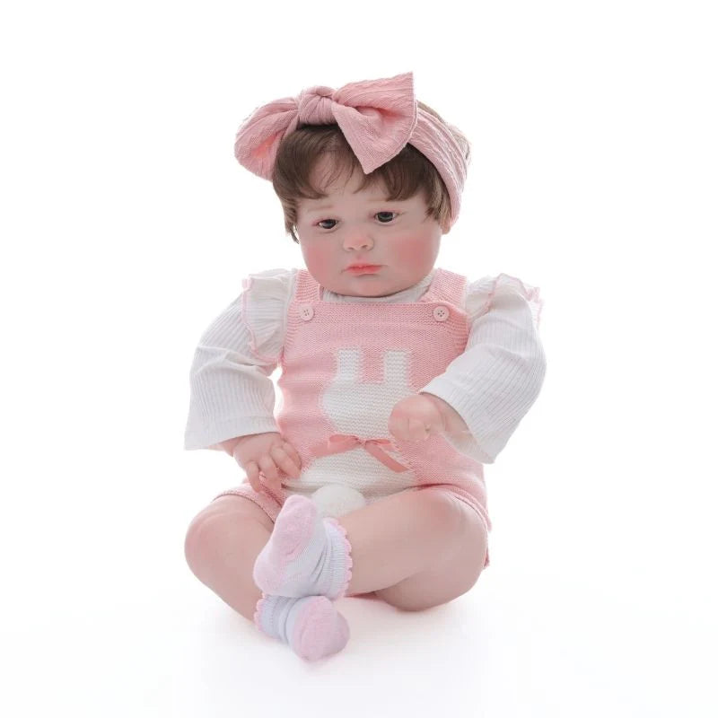 26 Zoll / 65 cm realistische Vinyl-Babypuppe im rosa Outfit mit Schleifen-Stirnband – handbemalte Sammlerpuppe mit braunen Augen