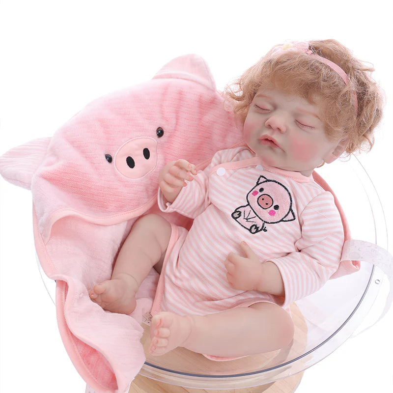 22 Zoll lebensechte Reborn-Babypuppe im Ferkel-Anzug