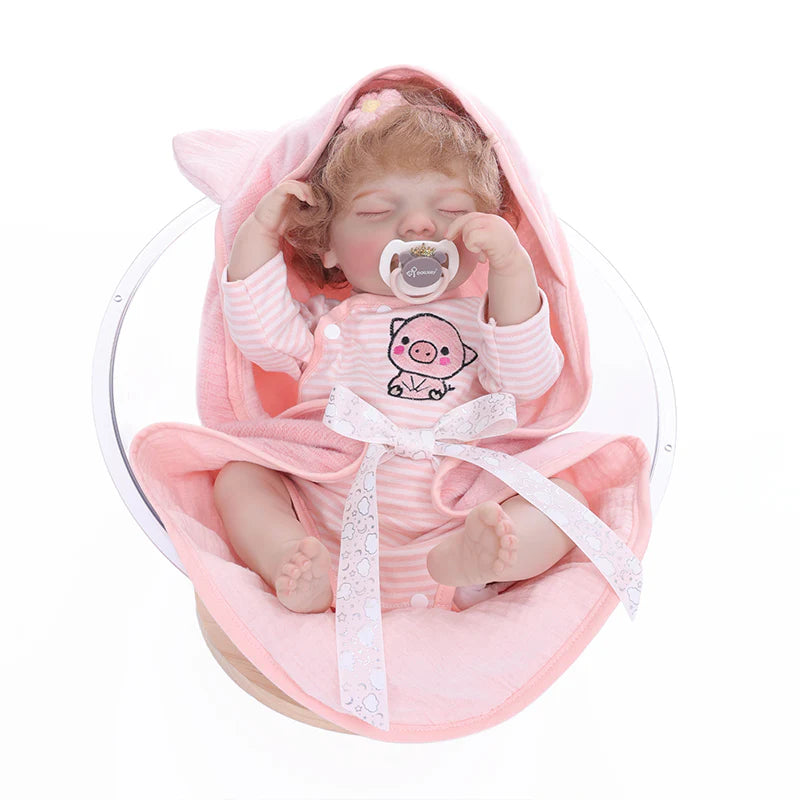 22 Zoll lebensechte Reborn-Babypuppe im Ferkel-Anzug