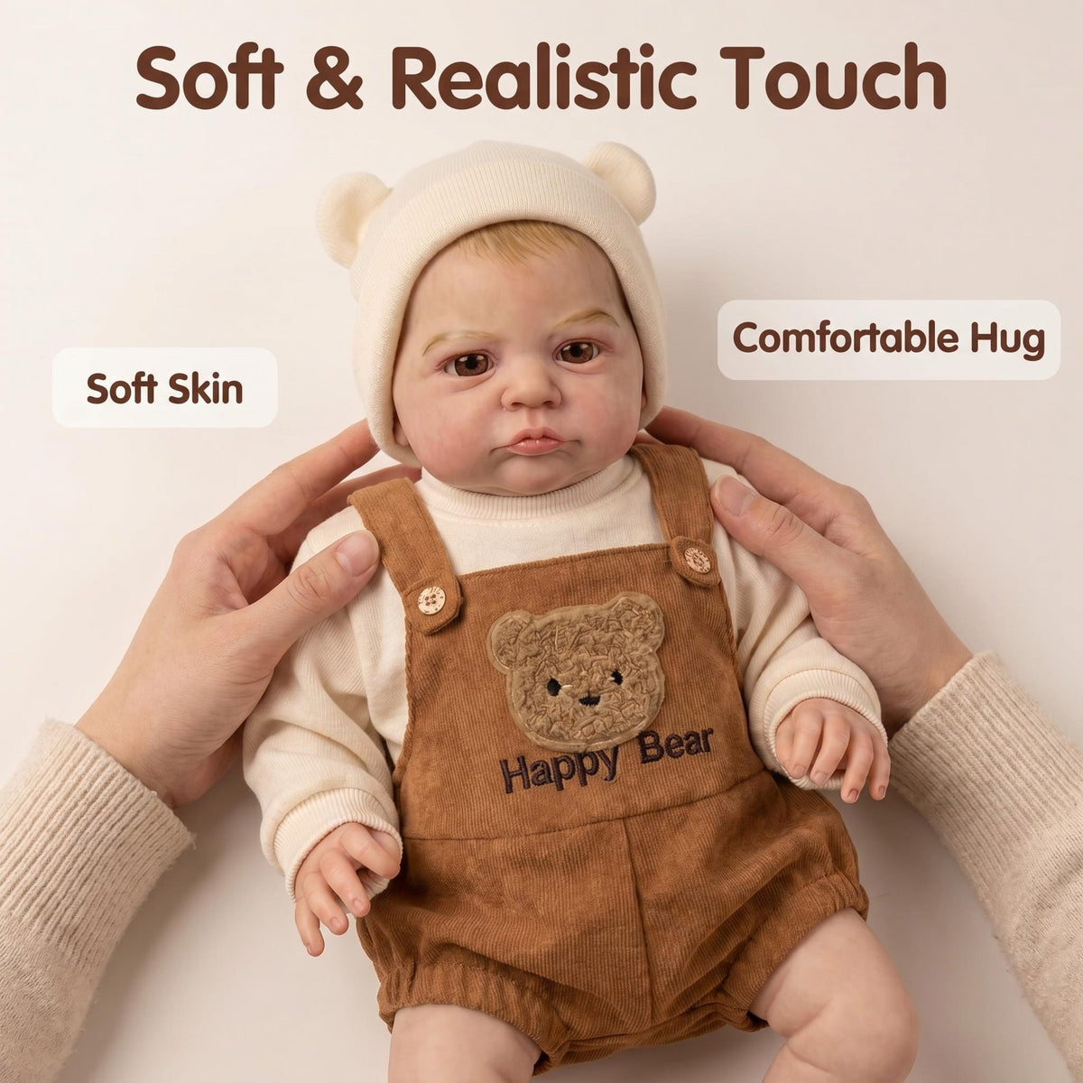 Comfort Hug 48 cm Reborn-Puppe mit Stoffkörper, cremefarbener Bärenmütze, realistischem, lebensechtem Gesicht, perfekte Dekoration für Schlafzimmer oder Kinderzimmer, Geschenk