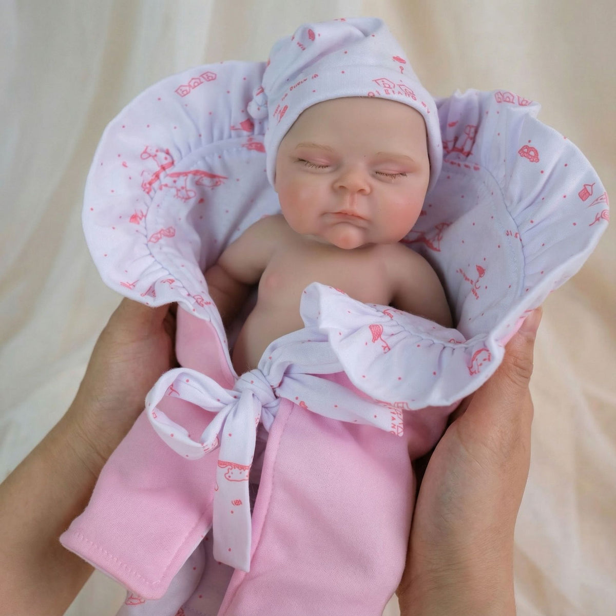 12-Zoll-Tasche in Rosa mit Pascale-Silikon-Reborn-Puppe als Weihnachtsgeschenk für Kinder