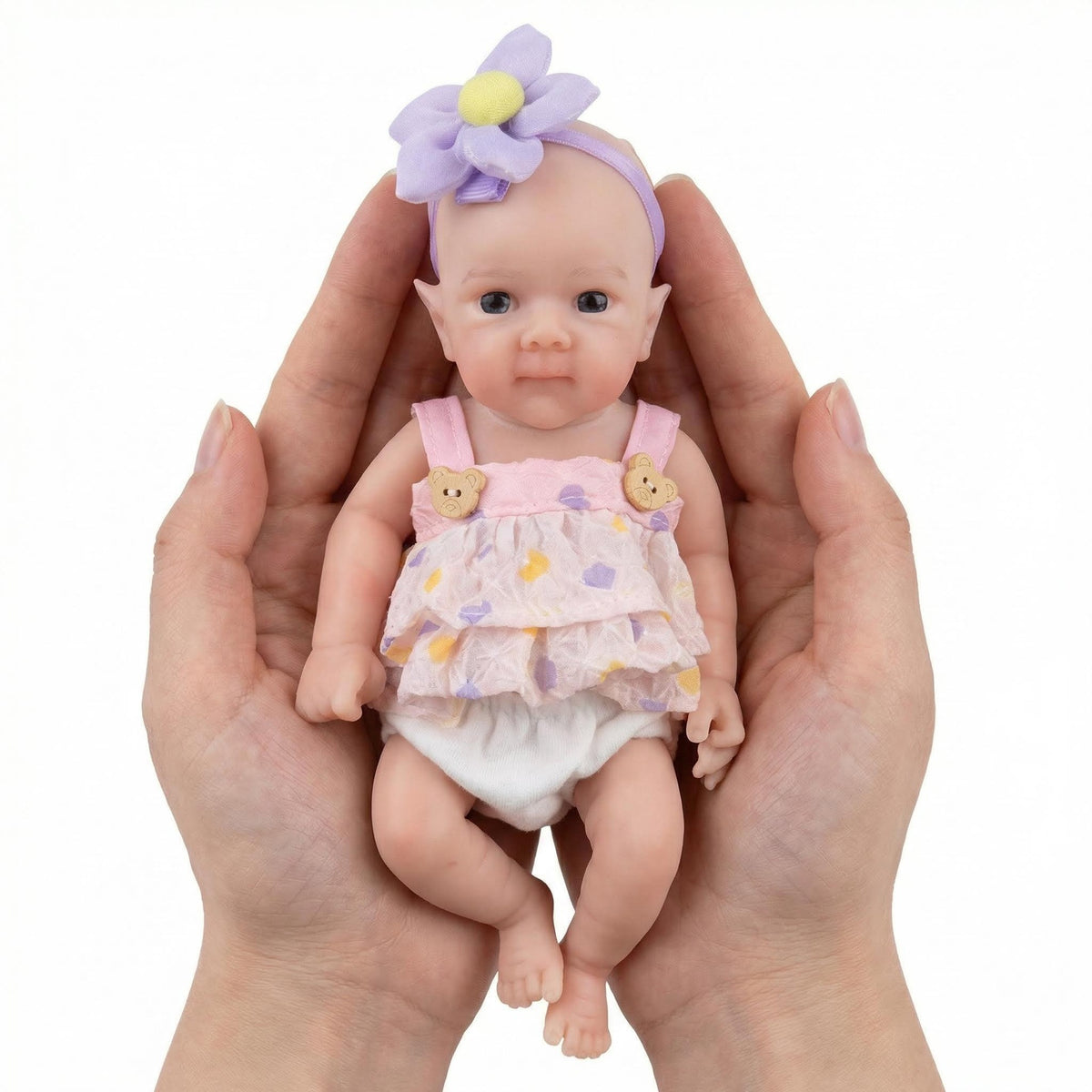 8-Zoll-Reborn-Puppe aus reinem Silikon mit lila Blumenkopf