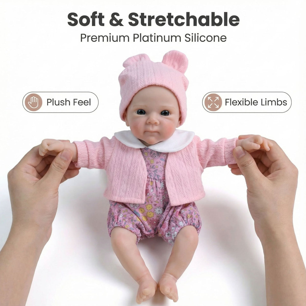 12-Zoll Reborn-Puppe aus Vollsilikon mit rosa Jacke und kleinem Blumenmuster