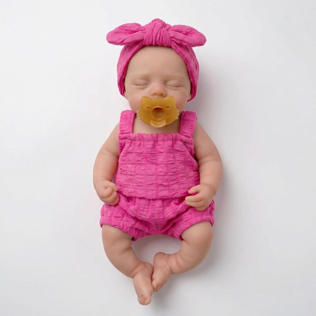 Rosenrotes Bubble-Outfit, 12-Zoll-Reborn-Babypuppe aus Vollsilikon, schlafend, mit übergroßer Schleife am Turban, geschlossene Augen, Mini-Neugeborenes, Sammlerpuppe