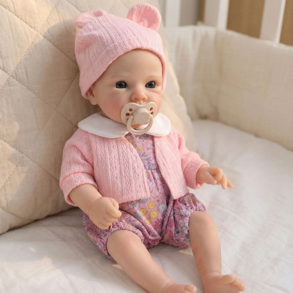 12-Zoll Reborn-Puppe aus Vollsilikon mit rosa Jacke und kleinem Blumenmuster