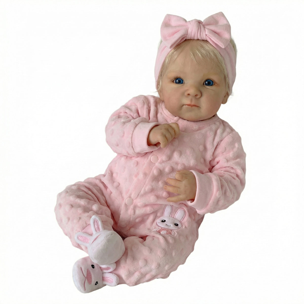 18-Zoll-Reborn-Puppe Bettie aus Vollvinyl im rosa Hasen-Strampler