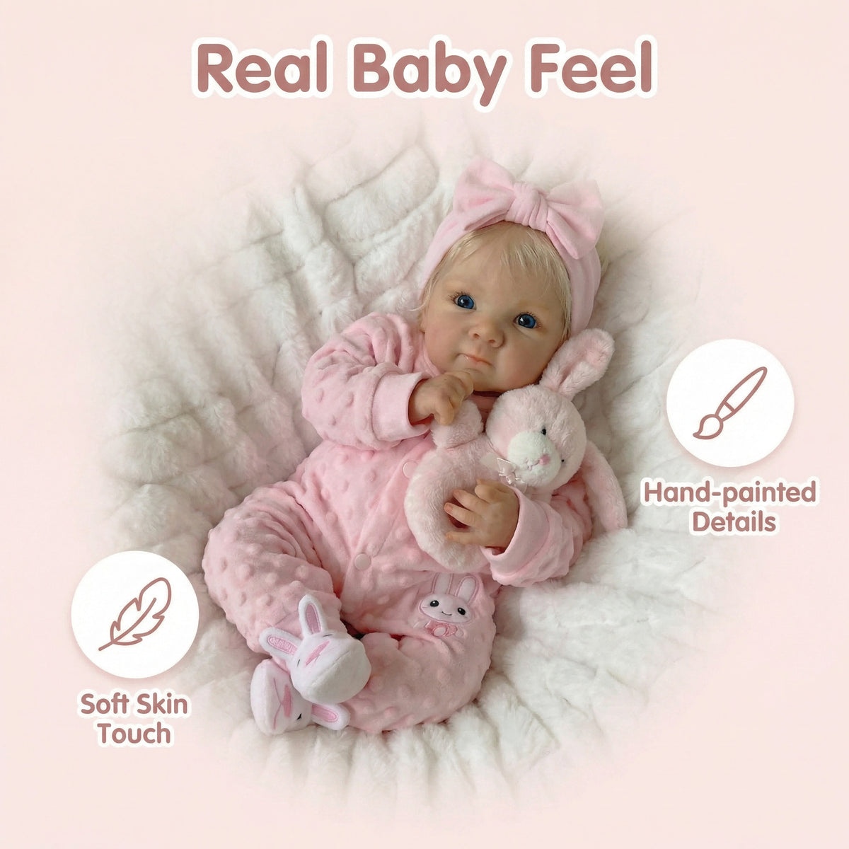 18-Zoll-Reborn-Puppe Bettie aus Vollvinyl im rosa Hasen-Strampler