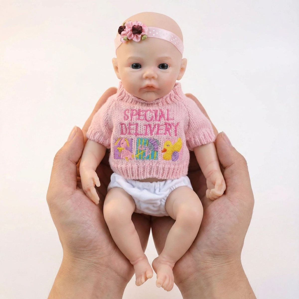 12-Zoll-Pulloveroberteil in Pink mit einfarbiger Silikon-Reinkarnationspuppe als Weihnachtsgeschenk für Kinder