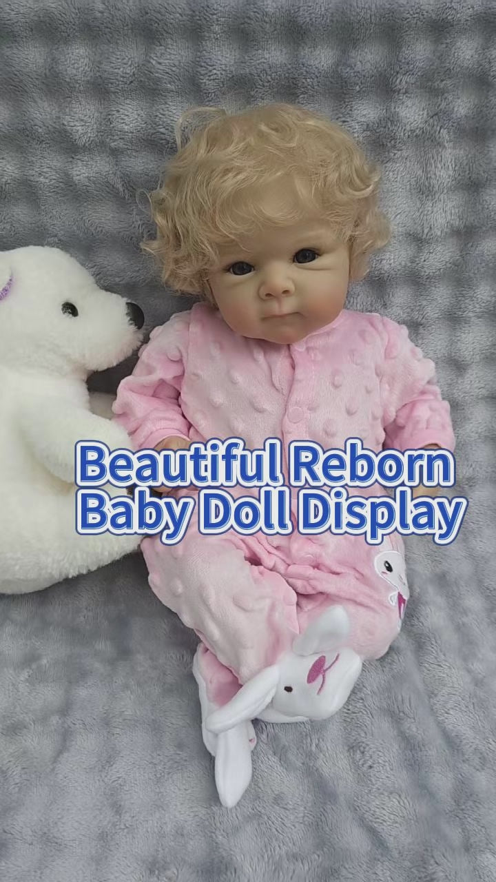 18-Zoll-Reborn-Puppe Bettie aus Vollvinyl im rosa Hasen-Strampler